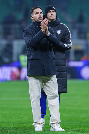 Cesc Fabregas Head Coach of Como 1907 greets the fans at the end of the match during Serie A 2025/26 football match between FC Internazionale and Como 1907 at San Siro Stadium. FC Internazionale 4-0 Como 1907