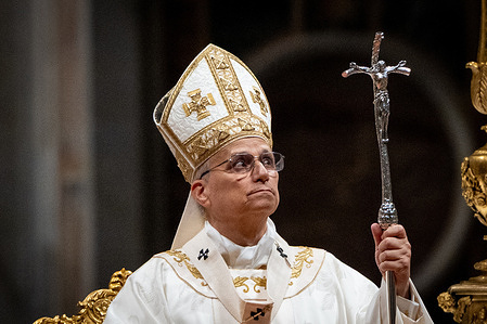 Pope Leo XIV leads the Easter Vigil as part of the Holy Week celebrations in St. Peter's Basilica.