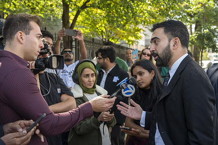 Democratic New York City mayoral candidate Zohran Mamdani speaks to media at a canvass in Astoria organized by the Muslim Democratic Club of New York at Sean's Place Park in the Queens borough of New York City.