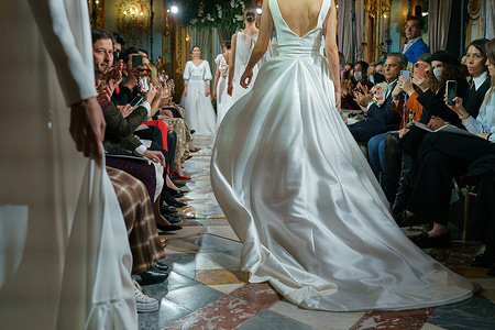 A model showcases Silvia Fernandez design during the Atelier Couture bridal catwalk within Madrid Fashion Week, held at the Santonia Palace in Madrid.