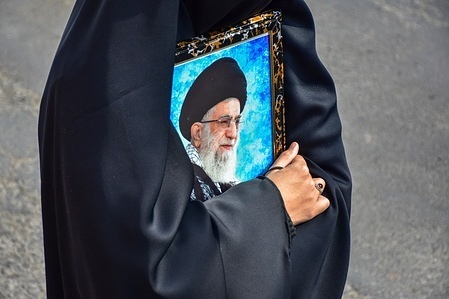 A Kashmiri Shiite Muslim protester holds a photograph of the deceased Iranian Supreme Leader, Ayatollah Ali Khamenei, during a protest against the U.S. and Israel in Budgam, about 25kms from Srinagar. Protests continue across the Kashmir valley over the killing of Iran’s Supreme Leader Ayatollah Ali Khamenei in a coordinated US-Israeli airstrike on Tehran. Strict restrictions remained imposed in many areas of Kashmir for the third consecutive day. Schools and colleges have been shut until Saturday, mobile internet remains throttled, and heavy security deployment continues across sensitive areas.
