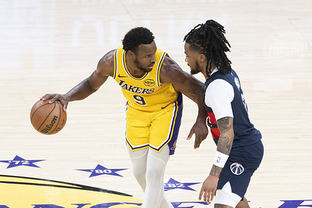 Los Angeles Lakers’ Bronny James (9) is defended by Washington Wizards’ Sharife Cooper (13) during an NBA basketball game at Crypto.com Arena