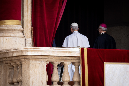 Pope Leo XIV leaves the central balcony of St. Peter's Basilica after his first Sunday blessing after his election in St. Peter's Square.