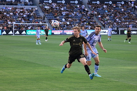 Forward Jacob Shaffelburg (18) of Los Angeles FC and Defender Dave Romney (4) of the San Jose Earthquakes seen in action during a game between the San Jose Earthquakes and Los Angeles FC at BMO Stadium. Final score; San Jose Earthquakes1:4 Los Angeles FC
