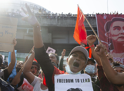 A protester chants slogans during the demonstration.
Thousands of people took to the streets of Yangon on the fourth day of protest against the military coup and demanded the release of Aung San Suu Kyi. Myanmar's military detained State Counsellor of Myanmar Aung San Suu Kyi on February 01, 2021 and declared a state of emergency while seizing the power in the country for a year after losing the election against the National League for Democracy (NLD).