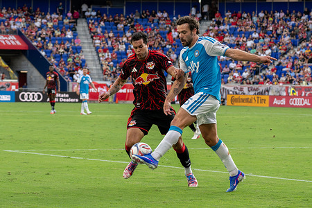 Cade Cowell (7) of the New York Red Bulls and Harry Toffolo (15) of Charlotte FC seen in action during an MLS regular season match between New York Red Bulls and Charlotte FC at Sports Illustrated Stadium. Final scores; New York Red Bulls 0:2 Charlotte FC.