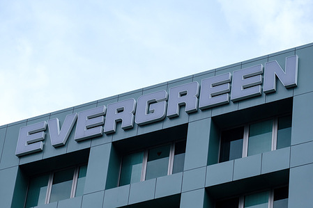 The logo of Evergreen Marine Corporation seen on the façade of the company headquarters in Taipei.