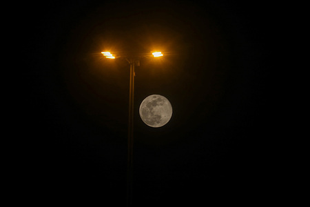 The first full supermoon of the year 2026, known as the "Wolf Moon," seen in the sky over Doha, Qatar.