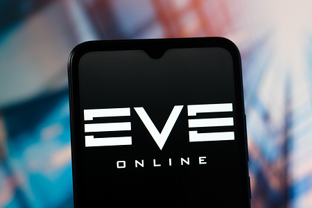In this photo illustration, the EVE Online logo is seen displayed on a smartphone screen.