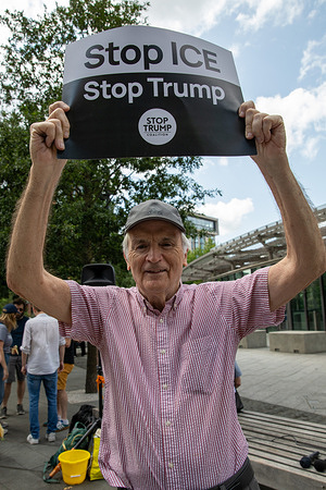 A protestor holds a placard expressing his opinion during the demonstration. A protest was held at the US embassy in London by American citizens against the policies of US President Donald Trump. Organised by Invisible’s, Hands Off and Democrats Abroad, hundreds of activists attended with many carrying placards and signs with some dressed as clowns. This latest protest was one of several held globally against the US Presidents economic, domestic and foreign policies.