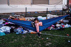 Hatay, Turkey - 14/02/2023 18:00:52: A child seen sitting in a hammock in a relief shelter. Turkey and Syria have experienced the worst earthquakes to strike the region in almost a century. A 7.8-magnitude quake struck southeastern Turkey, which was followed by a second quake of 7.7 in northern Syria. More than 30,000 people are reported to have died due to the quakes, and the death toll is still rising.