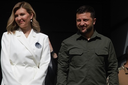 Ukrainian President Volodymyr Zelenskyy and his wife Olena Zelenska react to crowds in front of the Danish Parliament in Copenhagen. The US has approved NATO allies supplying American-made F-16 warplanes to Ukraine, with Denmark announcing plans to deliver jets. On Monday, Ukrainian President Volodymyr Zelenskyy and First Lady Olena Zelenska will visit the Danish Parliament, meet members of the Danish royal family, and address the Danish people.