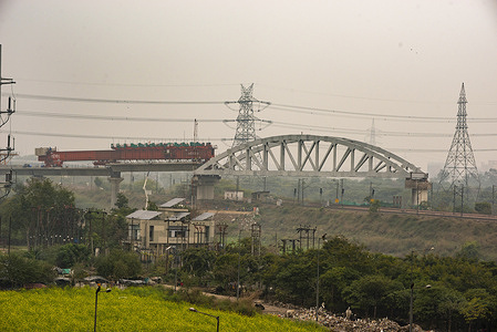 Delhi Meerut metro rail Bridge construction site over Railway line at Ghaziabad in Uttar Pradesh.
The under construction Delhi Meerut Regional Rapid Transit System (Delhi–Meerut RRTS), an 82.15km long track, is a semi high speed rail corridor that will connect Delhi Ghaziabad to Meerut .