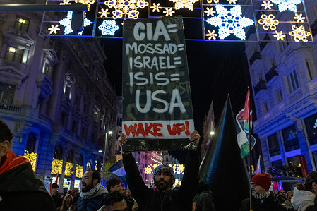 A protester holds a placard expressing his opinion during the demonstration. A demonstration in downtown Madrid, protesters demanded that the media continue reporting on the situation in Palestine and expressed their opposition to Trump's so-called peace plan, which they called "fake." They also commemorated the 78th anniversary of the partition of Palestine.