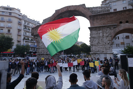 Protester waving the Kurdistan flag during the demonstration.
Members of Kurdish community of Thessaloniki protest showing solidarity with the Kurdish people in Kurdistan against the attacks of Turkey on North Syria. For the last eight days, a lot of civilians have died and many have been injured.