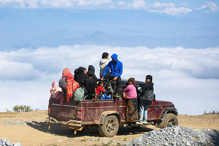 An overloaded public vehicle seen at a rural village of Tanahun. As the Dashain festival season ends, many people are returning to their homes from the villages. Many road accidents happened in the country during the festival season with most due to overloaded vehicles.