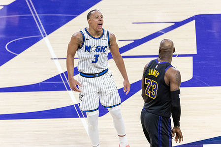 Orlando Magic’s Desmond Bane reacts in front of Los Angeles Lakers’ LeBron James (23) after hitting a 3-point shot during an NBA basketball game at Crypto.com Arena in Los Angeles. NBA 2026: Magic 110:109 Lakers.