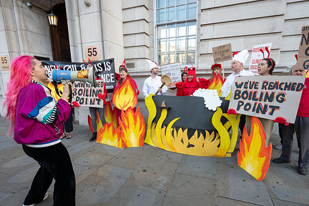 Activists from Fossil Free London stage a protest outside the Department for Energy Security and Net Zero (DESNZ) in Whitehall. The protest feature a giant lobster inside a cooking pot surrounded by demonstrators dressed as ‘Shell chefs’. The lobster represents a planet being pushed towards dangerous levels of warming, while the ‘Shell chefs’ represent the fossil fuel industry continuing to pursue new oil and gas projects. The action comes as the Government faces pressure over new North Sea oil and gas developments, including the Rosebank and Jackdaw fields.