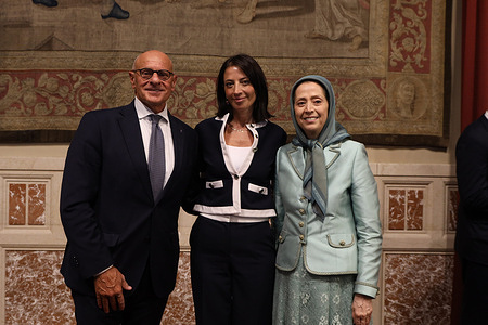 Vice President of the Chamber of Deputies Fabio Rampelli, Foreign Affairs Committee member Naike Gruppioni and President-elect of the National Council of Resistance of Iran (NCRI) Mrs. Maryam Rajavi pose for a photo following the parliamentary session at Italia Parliament. The Italian Parliament hosted a high-level conference in its historic Regina Hall entitled "The Iran Crisis and the Democratic Solution for the Future." The event brought together leading Italian lawmakers, American representatives, and international political figures to debate Europe's approach to Tehran, emphasize global security challenges, and highlight the struggle for a free and democratic Iran.