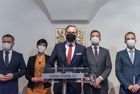 (from left to right) Marian Jurecka, chairman of KDU-CSL party, Marketa Pekarova Adamova chairman of TOP09 party, Petr Fiala new Czech Prime minister, Vit Rakusan chairman of STAN party and Ivan Bartos chairman of Pirati Czech Pirate Party (from left to right) are seen during a press conference. 
New Czech Prime minister Petr Fiala, leader of coalition SPOLU and chairman of ODS party, meets with Czech president Milos Zeman. Petr Fiala announced at a press conference that members of new government will be appointed this Friday by the president.