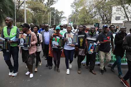 Independent Electoral and Boundaries Commission (IEBC) election officials and civil society activists march while holding placards as they call for protection. They also demanded justice for returning officer Daniel Musyoka, who was found dead on Monday, August 15, 2022 in Oloitoktok, Kajiado County.
