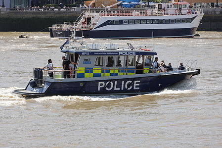 A police boat is seen on River Thames in London.