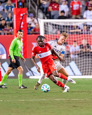 San Diego FC Midfielder Jeppe Tverskov (6)and Chicago Fire Midfielder Rominigue Kouamé (6) seen in action during the match between Chicago Fire FC and San Diego FC at Solider Field. Final Score: Chicago Fire 1-2 San Diego FC.