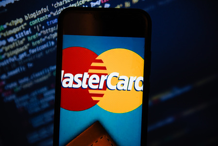 MasterCard logo is seen on an android mobile phone.