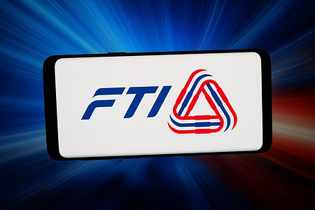 In this photo illustration, the logo of association Federation of Thai Industries FTI is displayed on a smartphone in front of abstract background on computer screen.