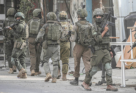 Israeli infantry force seen withdrawing from Palestinian homes during a raid at the Balata refugee camp. Violence in the city that Israel has occupied since 1967 has surged throughout the Gaza war that began in October 2023. At least 968 Palestinians, including militants and civilians, have been killed by Israeli soldiers or settlers since the Gaza war broke out.
