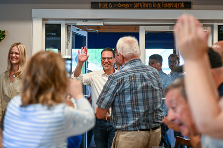 Governor Josh Shapiro (C) enters the Ave Diner in Wyoming to campaign with Scranton Mayor Paige Cognetti (L). Scranton Mayor Paige Cognetti launched her congressional campaign alongside Pennsylvania Governor Josh Shapiro. Cognetti is set to face Republican candidate Rob Bresnahan in the November election.
