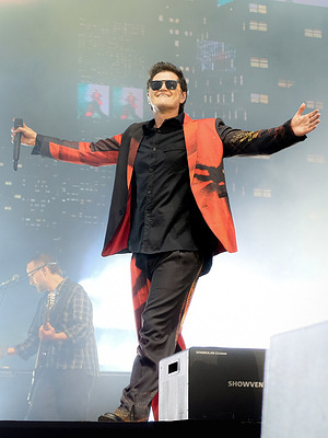 Danny O'Donoghue lead vocalist, guitarist, pianist, and keyboards player with Irish soft-rock band The Script performing live on stage at Isle of Wight Festival.