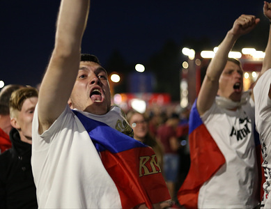 A man is seen raising his hands celebrating the Russian win.
Russians fans celebrate the victory of their team who beat Egypt (3-1) during the Russia's 2nd Group A match at the FIFA world cup 2018