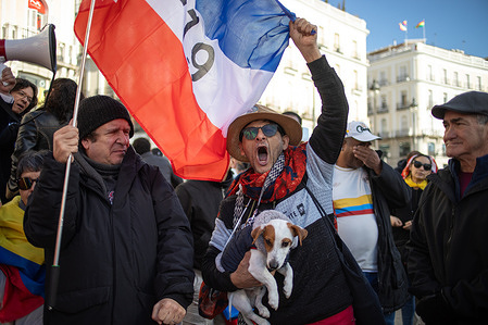 A couple with a flag of the Colombian left-wing group M-19 (April 19 Movement).takes part during a demonstration. A demonstration led primarily by Colombian citizens and left-wing political organizations, protesters gathered in response to US President Donald Trump's threats of a possible military intervention in Colombia. This intervention was seen as a continuation of the operation carried out days earlier in Venezuela, in which Nicolás Maduro and his wife were arrested and extradited to the United States.