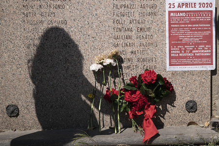 Flowers are seen in front of a commemorative headstone in Porta Romana.
Despite the lockdown due to the COVID-19 pandemic, Volunteers from the Emergency Brigades celebrate the 75th Liberation Day (Festa della Liberazione) in Milan, The celebration commemorates the victory of the Italian Partisans, serving in the Italian Resistance, and the fall of Mussolini’s troops, at the end of the World War ll.