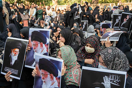 A group of women grieved and held posters of Iranian Supreme Leader Ayatollah Ali Khamenei as members of the Shia community gather at Jantar Mantar to attend a protest and condolence assembly organized to express grief and condemnation in New Delhi. The Ulema of Delhi and the All India Shia Council organized the demonstration following the reported death of Iranian Supreme Leader Ayatollah Ali Hosseini Khamenei in an attack by the United States and Israel