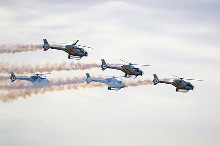 The Aspa patrol acrobatics show seen in tribute to the100th anniversary of the Plus Ultra flight. This journey in 1926 first united Spain and Argentina by crossing the Atlantic Ocean marking a milestone in the history of world aviation.
The Aspa Patrol is the Spanish Air Force and Space Aerobatic Helicopter Group. The Aspa Patrol uses five Eurocopter EC 120B Colibri helicopters.