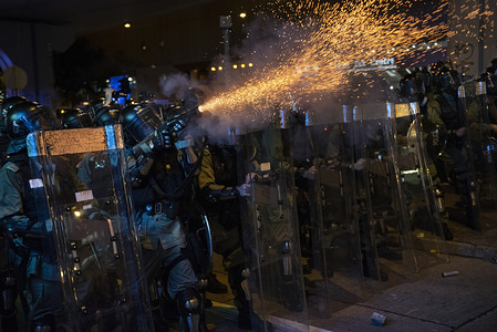 Riot police fire tear gas at protesters during the protest. Tens of thousands of pro-democracy protesters marched in central Hong Kong in yet another round of anti government demonstration. Riot police has used tear gas and rubber bullets against protesters despite the fact that the police force has been widely criticized by the public for their disproportionate use of force against the protesters in past demonstrations triggered by the controversial extradition bill put forward by the Hong Kong government.