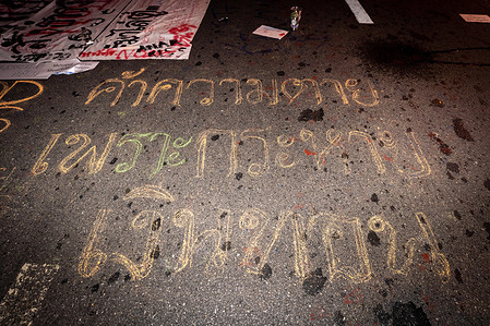 Graffiti written by protester saying "Trade people lives for money", during the demonstration.Pro-democracy protesters gathered at Ratchaprasong Intersection demanding Prayuth Chan-O-Cha resignation.