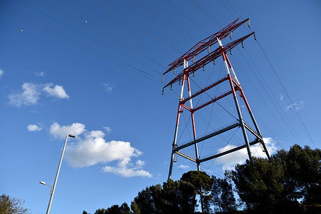 An electricity pylon supporting very high voltage lines.