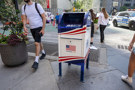 United States Postal Service (USPS) collection box painted in special commemorative schemes to honor the United States 250th Independence Day also known as the Semiquincentennial seen on the street at Columbus Circle on July 02, 2026 in New York City.