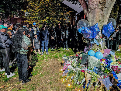 People pay tribute at the vigil of a British teenager jailed in Dubai and killed in a car crash months after his release. Marcus Fakana, 19, was a passenger in a vehicle that crashed. He was taken tothe hospital with serious injuries and later died.