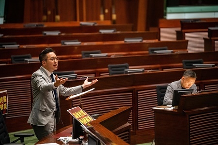 Legislative member Alvin Yeung of Civic Party reacts as he spoke during the last day of reading of the National Anthem Bill at the Legislative Council.