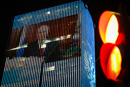 Multimedia light projection with Russian President Vladimir Putin on the facade of the 42-story skyscraper of the Lider Tower business center in St. Petersburg.