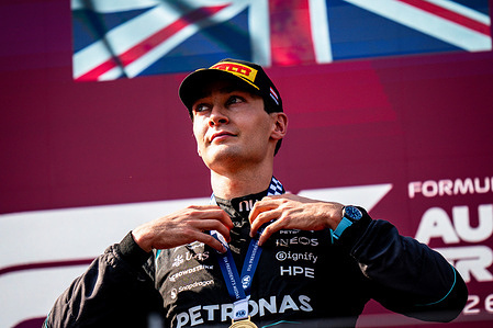 George Russell (GBR) (Mercedes-AMG Petronas F1 Team) on the podium of the Formula 1 Lenovo Austrian Grand Prix 2026 at the Red Bull Ring.