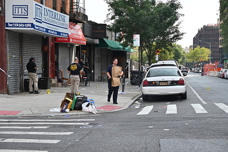 Police officials with the New York City Police Department work at the scene where three people are killed and ten others are injured in a mass shooting inside Taste of the City Bar and Lounge on Franklin Avenue in Crown Heights, Brooklyn, New York, United States. Multiple shooters opened fire inside Taste of the City Lounge at 903 Franklin Avenue in the Crown Heights neighborhood Sunday morning at approximately 3:27 AM. EMS responded and transported a 19-year-old man identified as Marvin St. Louis, with multiple gunshot wounds about the body and a 35-year-old man identified as Jamel Childs with multiple gunshot wounds about the body to NYC Health and Hospitals/Kings County where they were later pronounced dead. A 27-year-old man identified Amadou Diallo, with a gunshot wound to the head, was pronounced dead on scene. Nine other victims were transported by EMS with gunshot wounds to local area hospitals in stable condition. During the investigation, police were informed of a tenth victim, who was removed by private means to NYC Health and Hospitals/Kings County, with a gunshot wound to the ankle. There are no arrests at this time and the investigation remains active and ongoing.