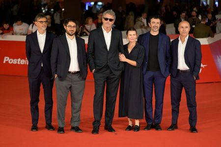 (L-R) Mario Gianani, a guest, Paweł Pawlikowski, Lorenzo Gangarossa, a guest and Lorenzo Mieli attend the red carpet for the film "Fatherland" at the 2026 Rome Film Fest, held at the Auditorium Parco della Musica.