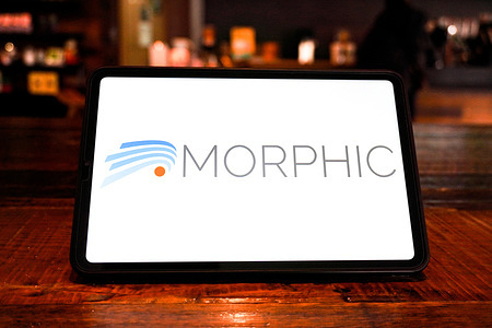 In this photo illustration, the Morphic logo is seen displayed on the screen of a smart tablet.