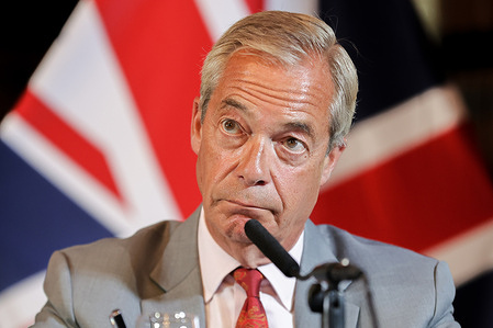 Reform UK leader Nigel Farage attends a press conference setting out plans to remove foreign nationals from British prisons in a bid to ease overcrowding.