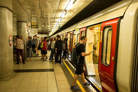 People getting in and out of the London underground.
London is the Capital city of England and the United Kingdom, it is located in the south east of the country. In 2017 it was home to 9 million people.